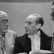 American film censor Joseph Breen, actor Sir Cedric Hardwicke, and director Alberto Cavalcanti discuss the script for a film version of the Charles Dickens novel The Life and Adventures of Nicholas Nickleby at Ealing Studios, London, July 1946. The film was ultimately made with an altered ending for the American market, since the Hays Code required that a character to be shown as insane if they are to commit suicide.